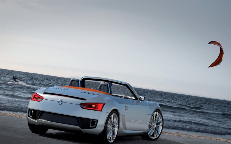 Volkswagen convertible on beach