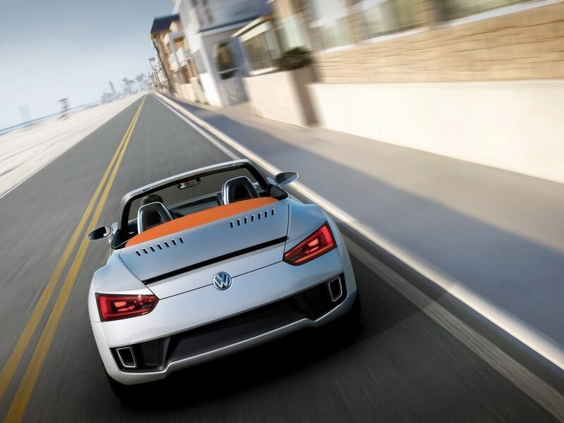 Volkswagen convertible on coastal road