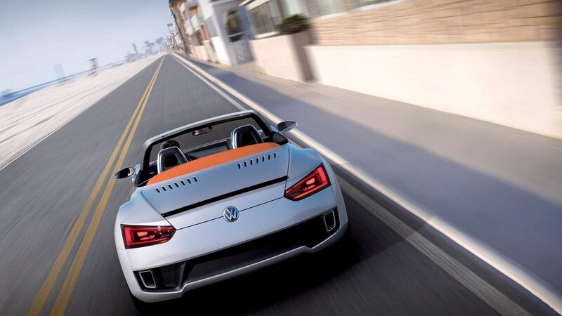 Volkswagen convertible on coastal road