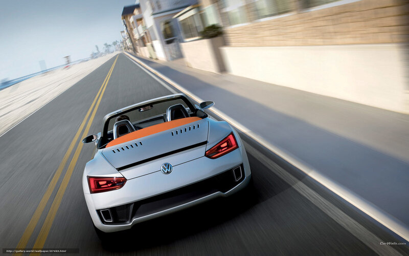 Volkswagen convertible on coastal road