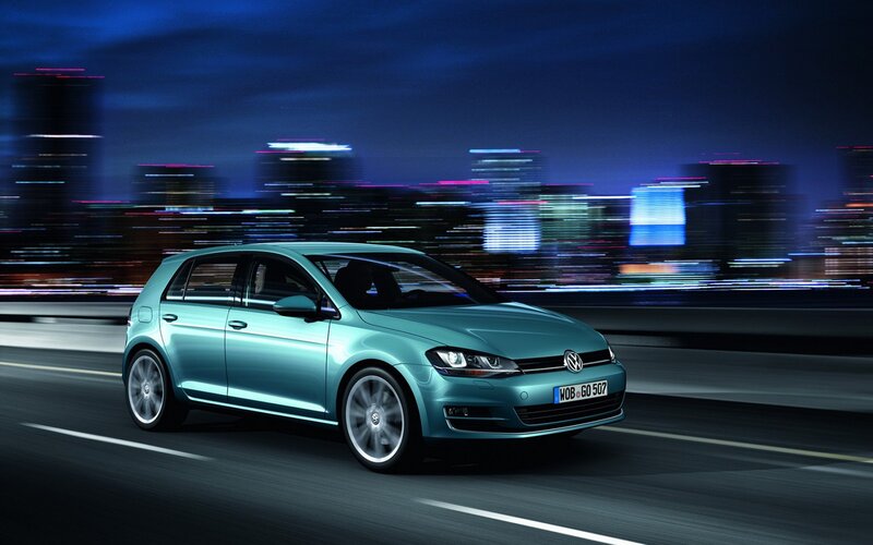 Volkswagen Golf in motion at night