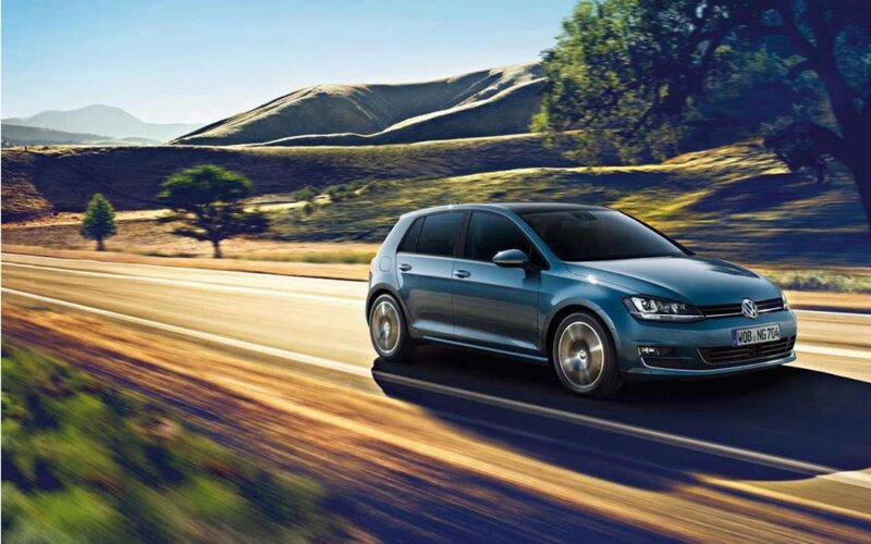 Volkswagen Golf on a scenic road