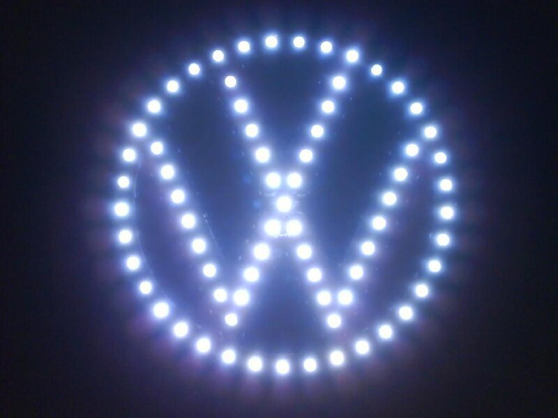 Volkswagen logo illuminated at night