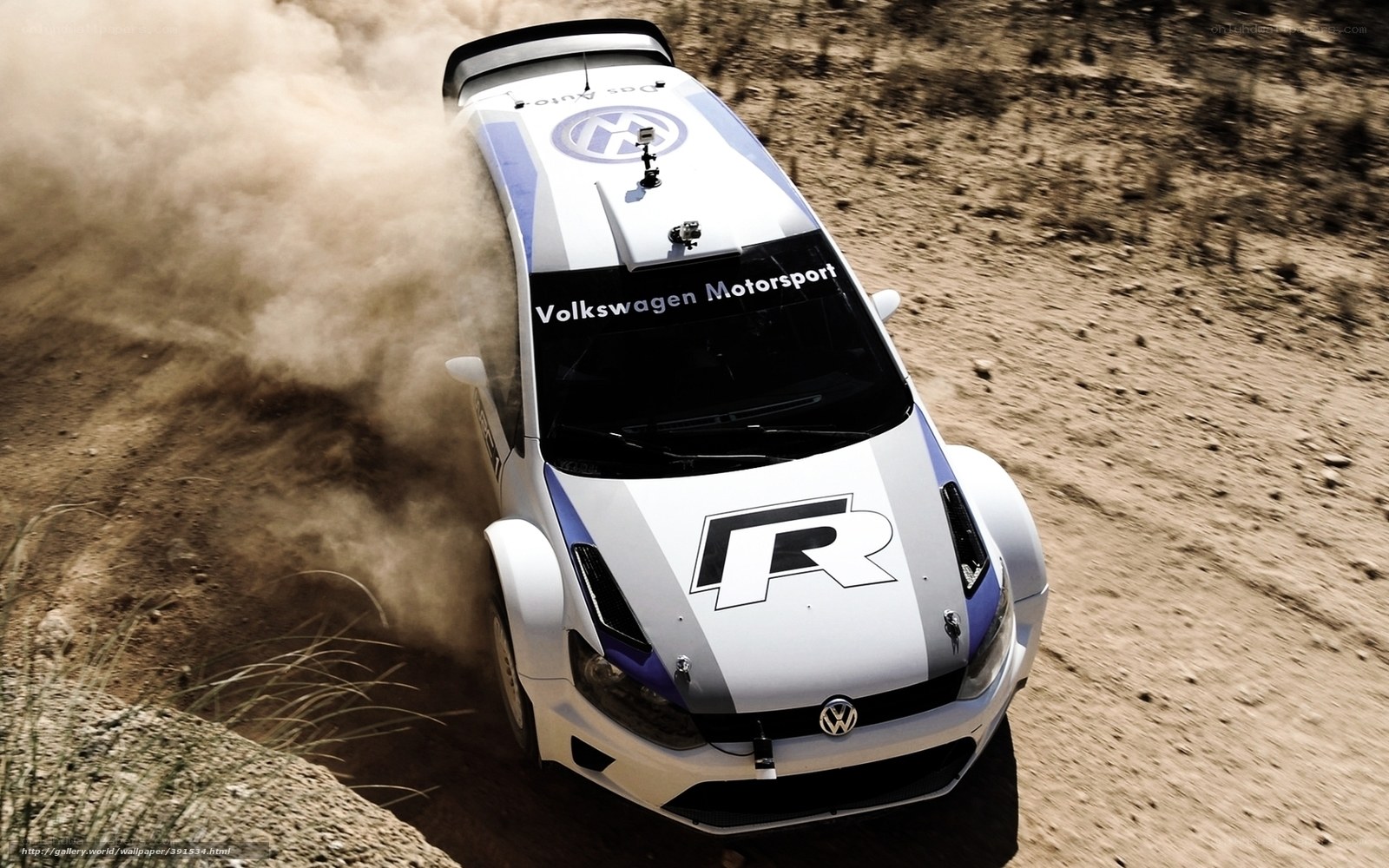 Volkswagen rally car on dirt track