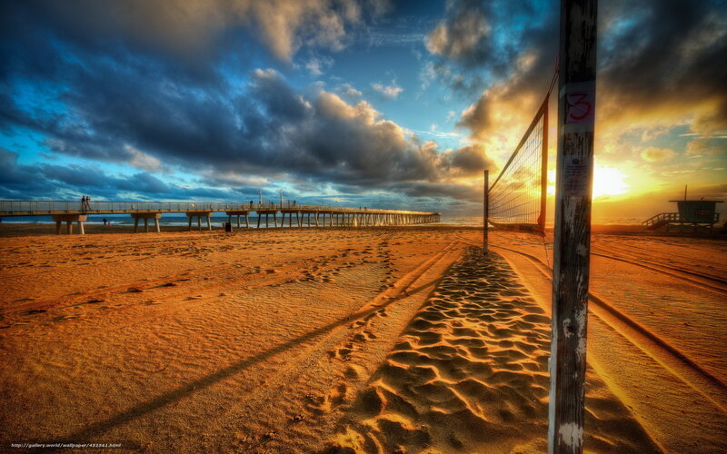 Volleyball net at sunset on beach