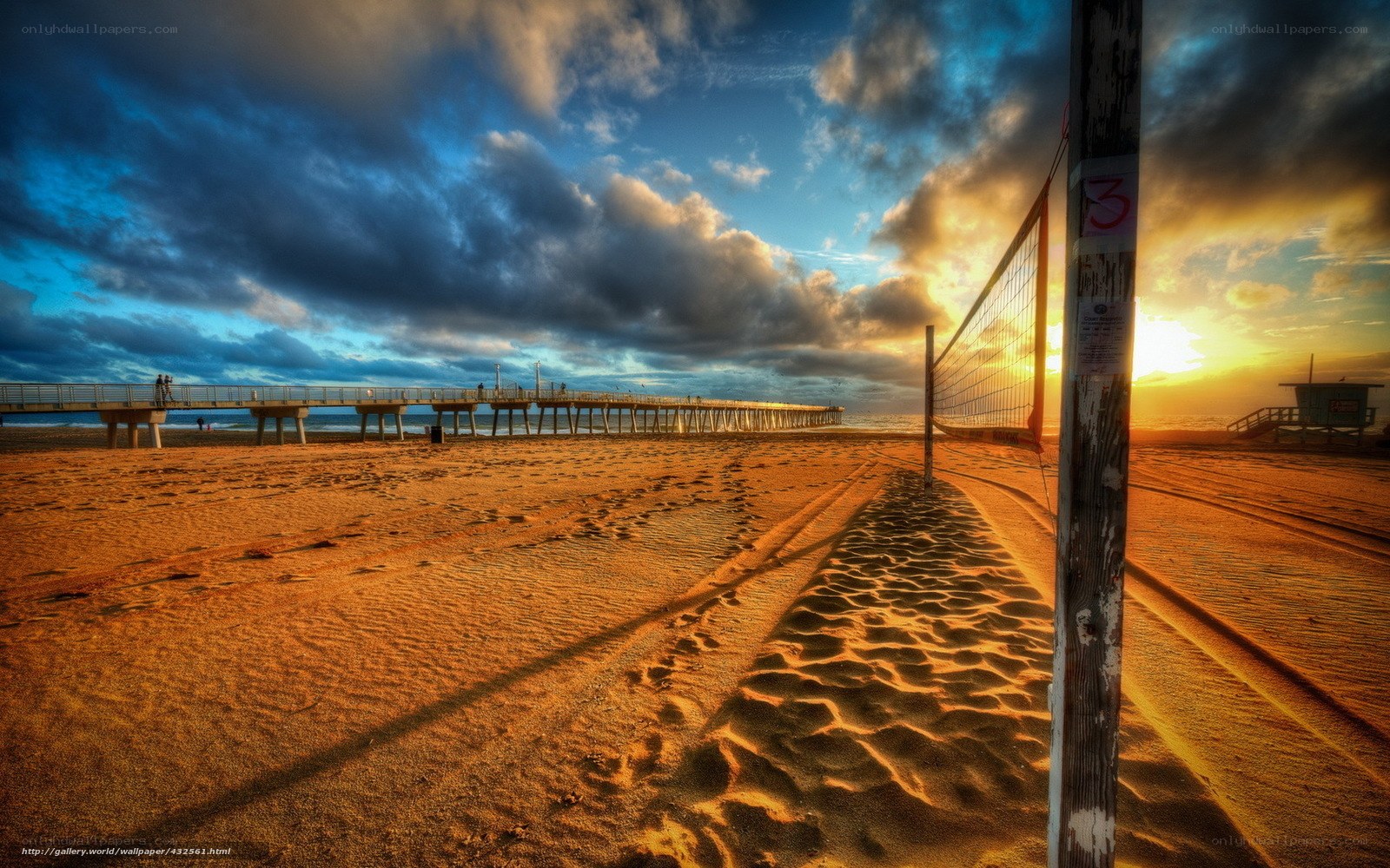 Volleyball net at sunset on beach