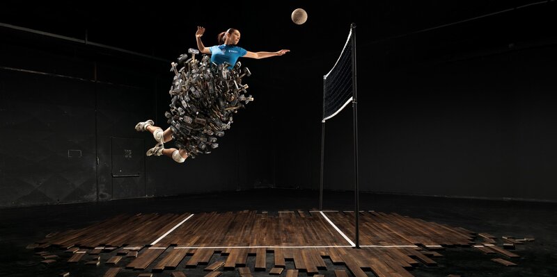 Volleyball player in mid-air jump