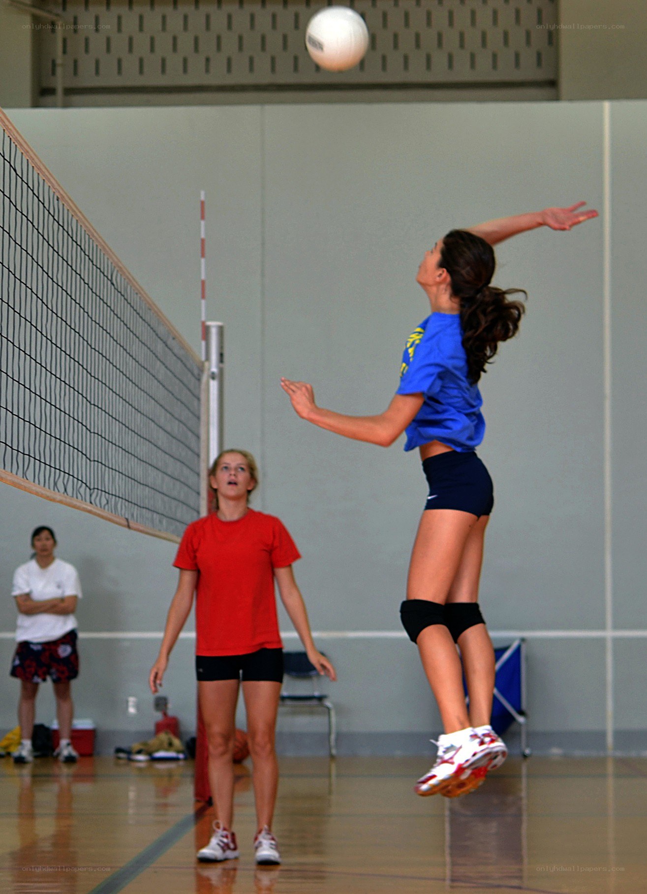 Volleyball player serving