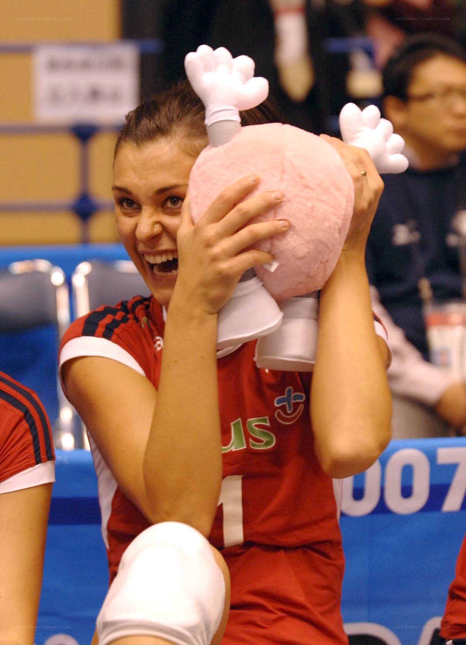 Volleyball player with mascot