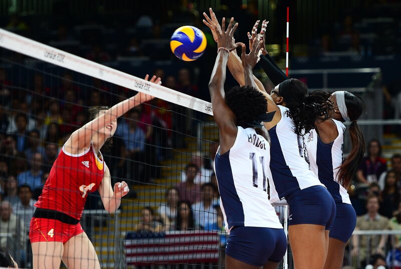 Volleyball Players at Net — Red, Intense
