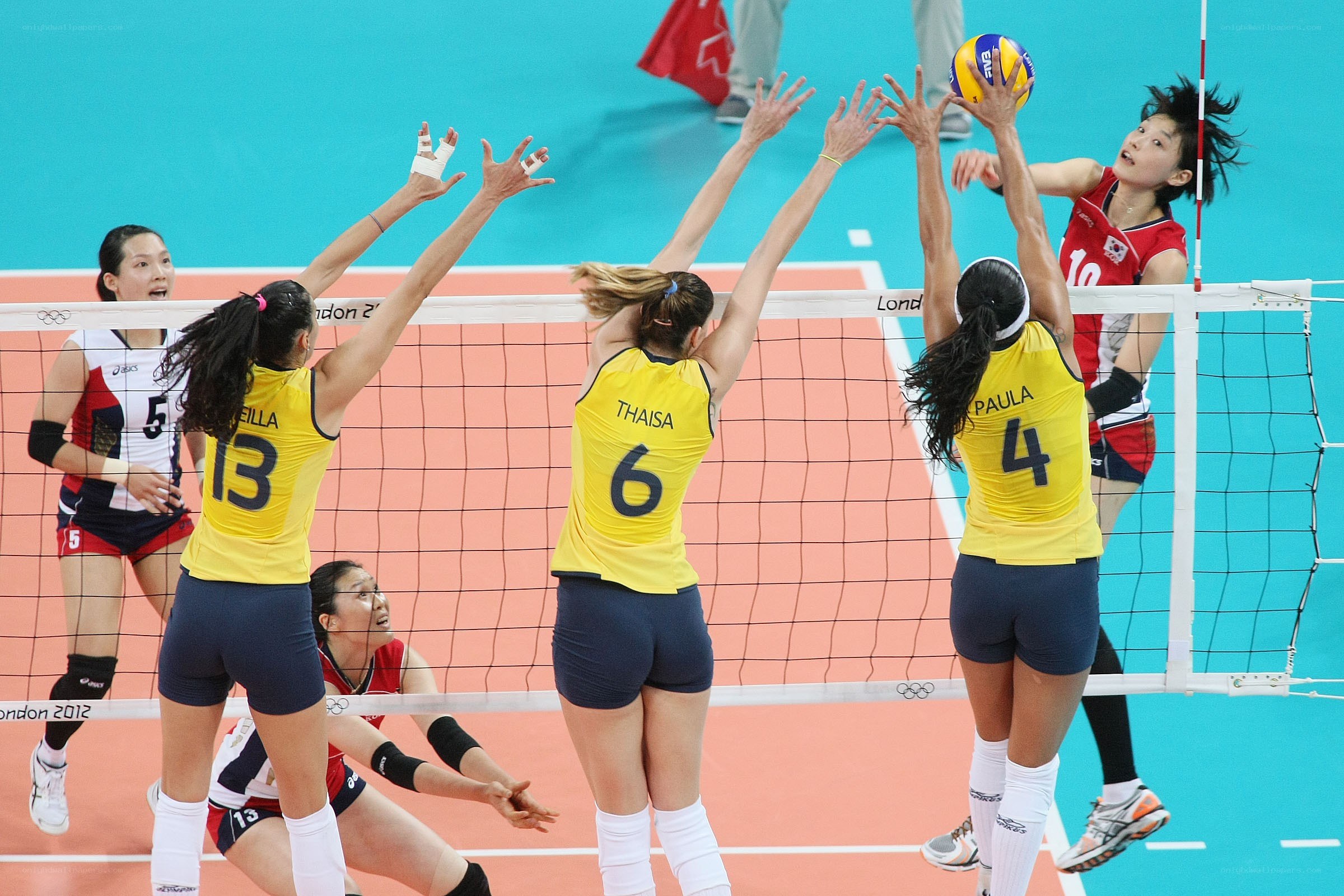 Volleyball players at the net