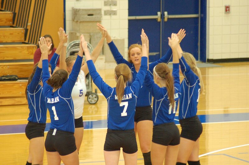 Volleyball team huddle