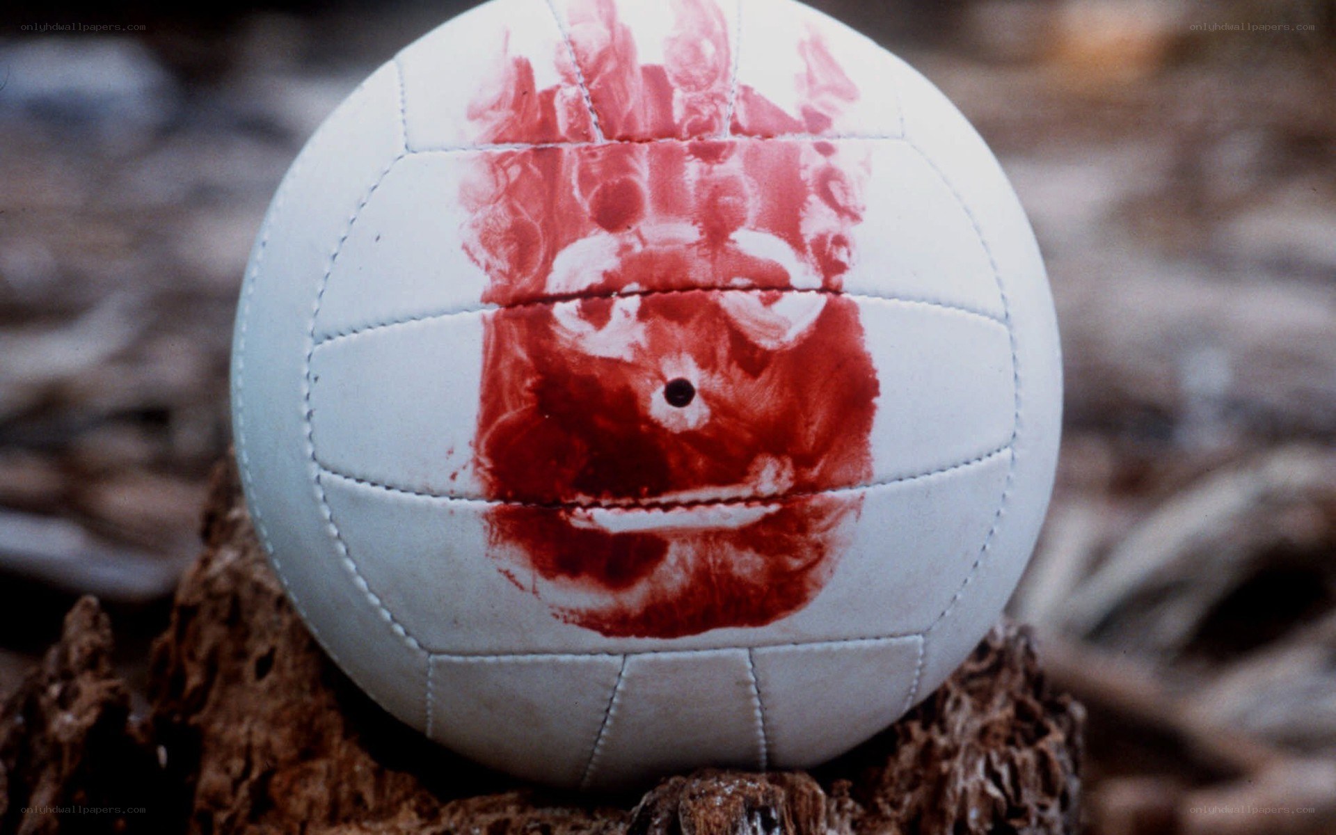 volleyball with red face drawing