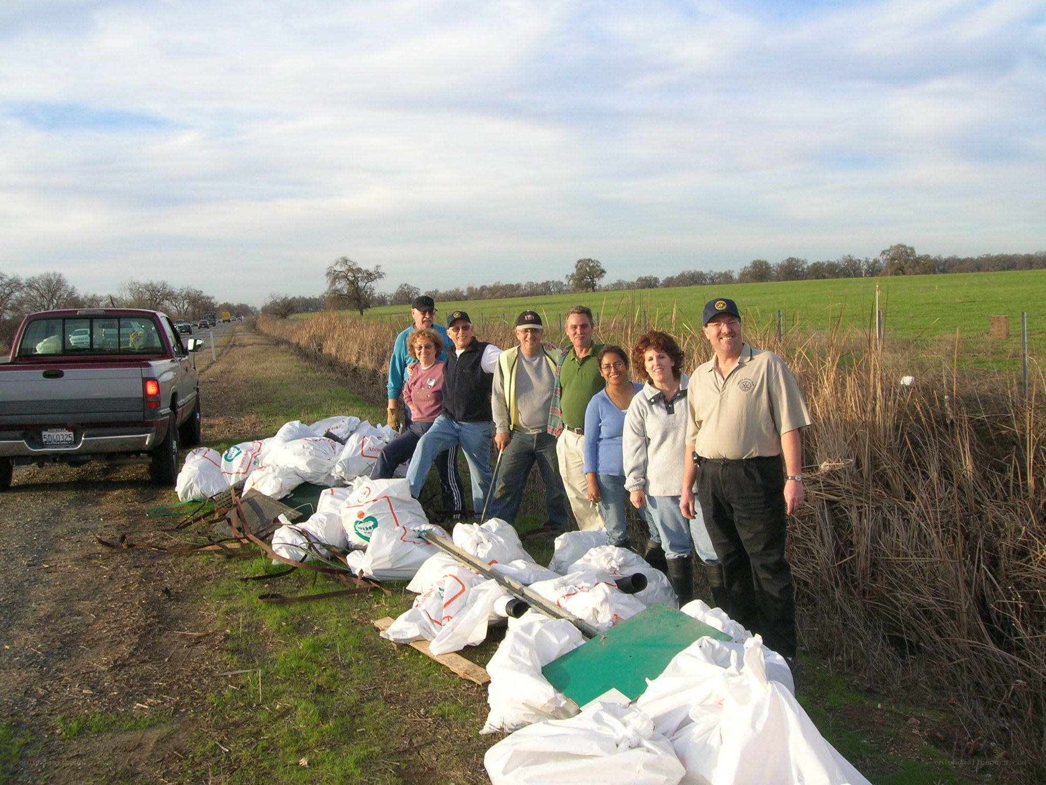 Volunteers with collected trash