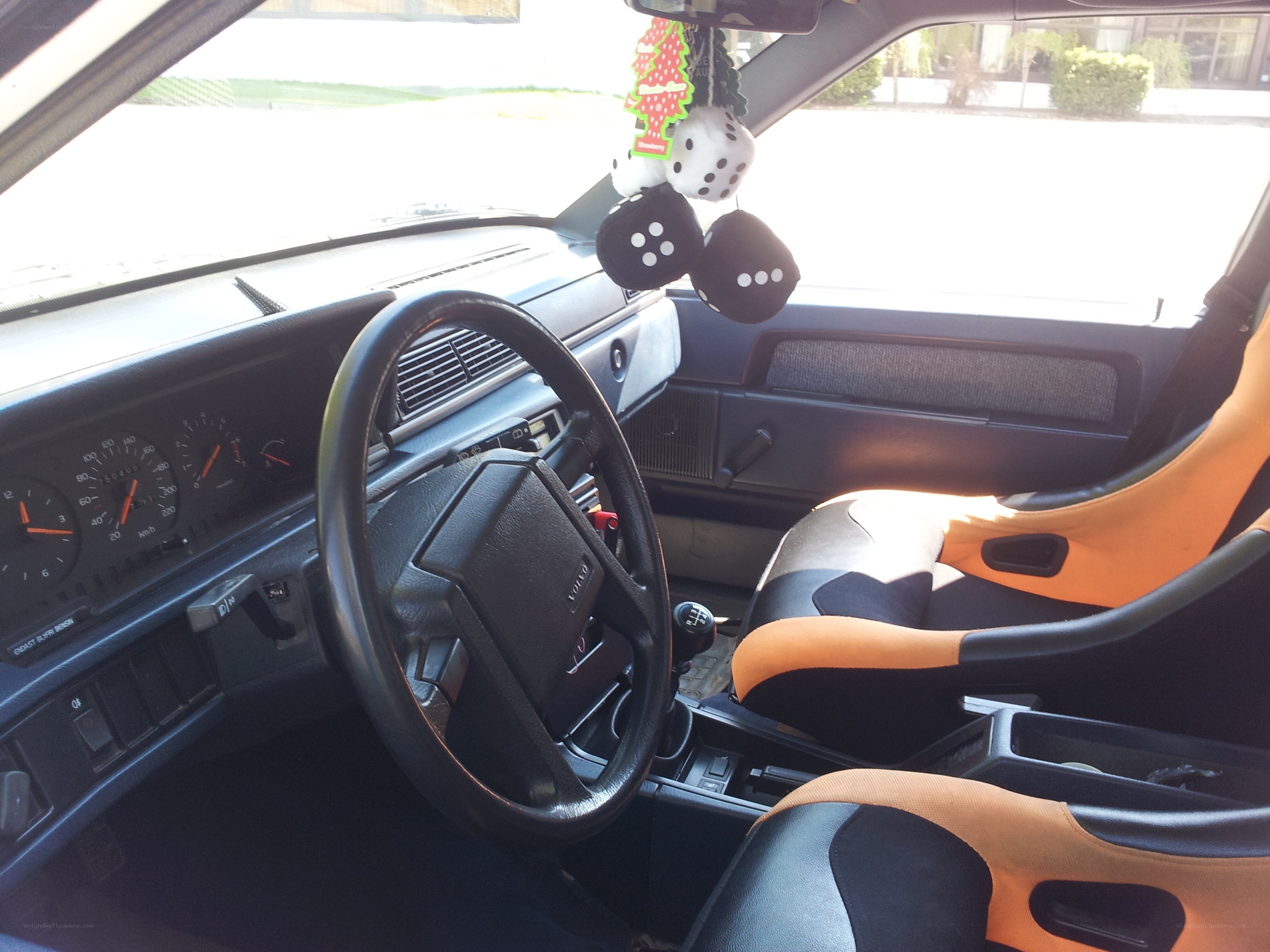 Volvo car interior with orange seats
