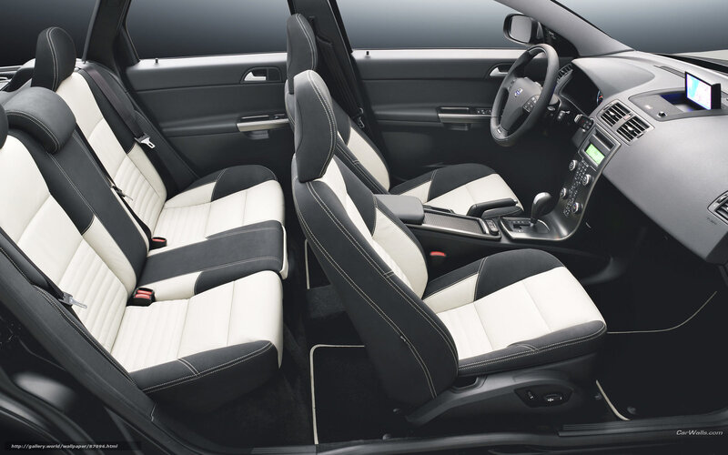 Volvo car interior with white and black seats