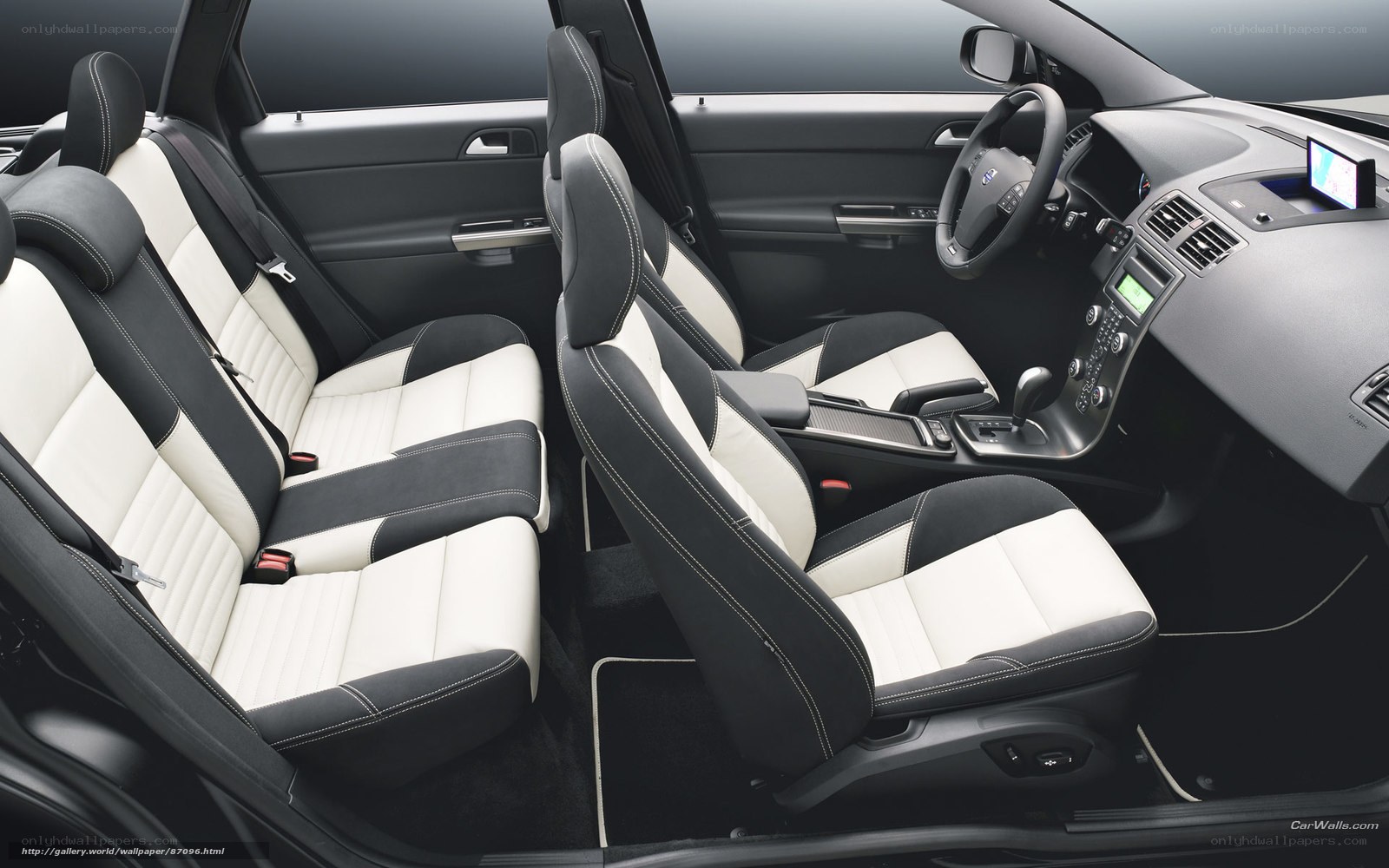 Volvo car interior with white and black seats