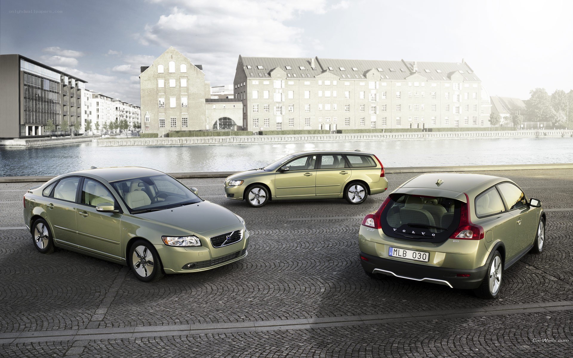 Volvo car lineup by water