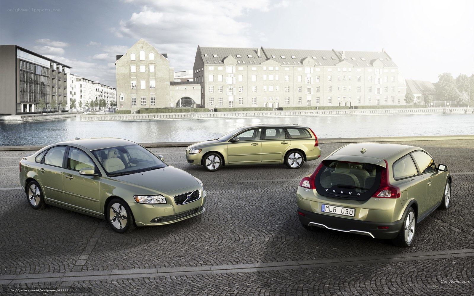 Volvo cars by the water