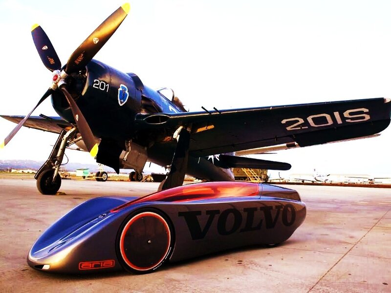 Volvo concept car with vintage plane