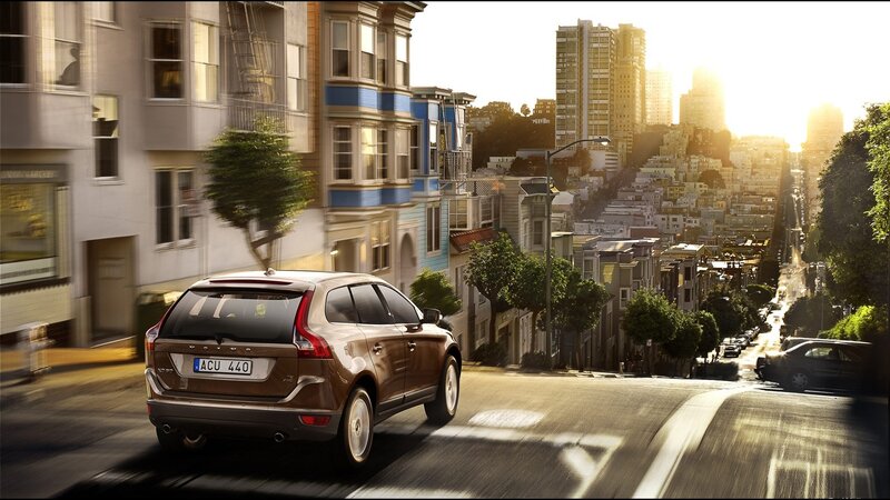 Volvo driving on a city street