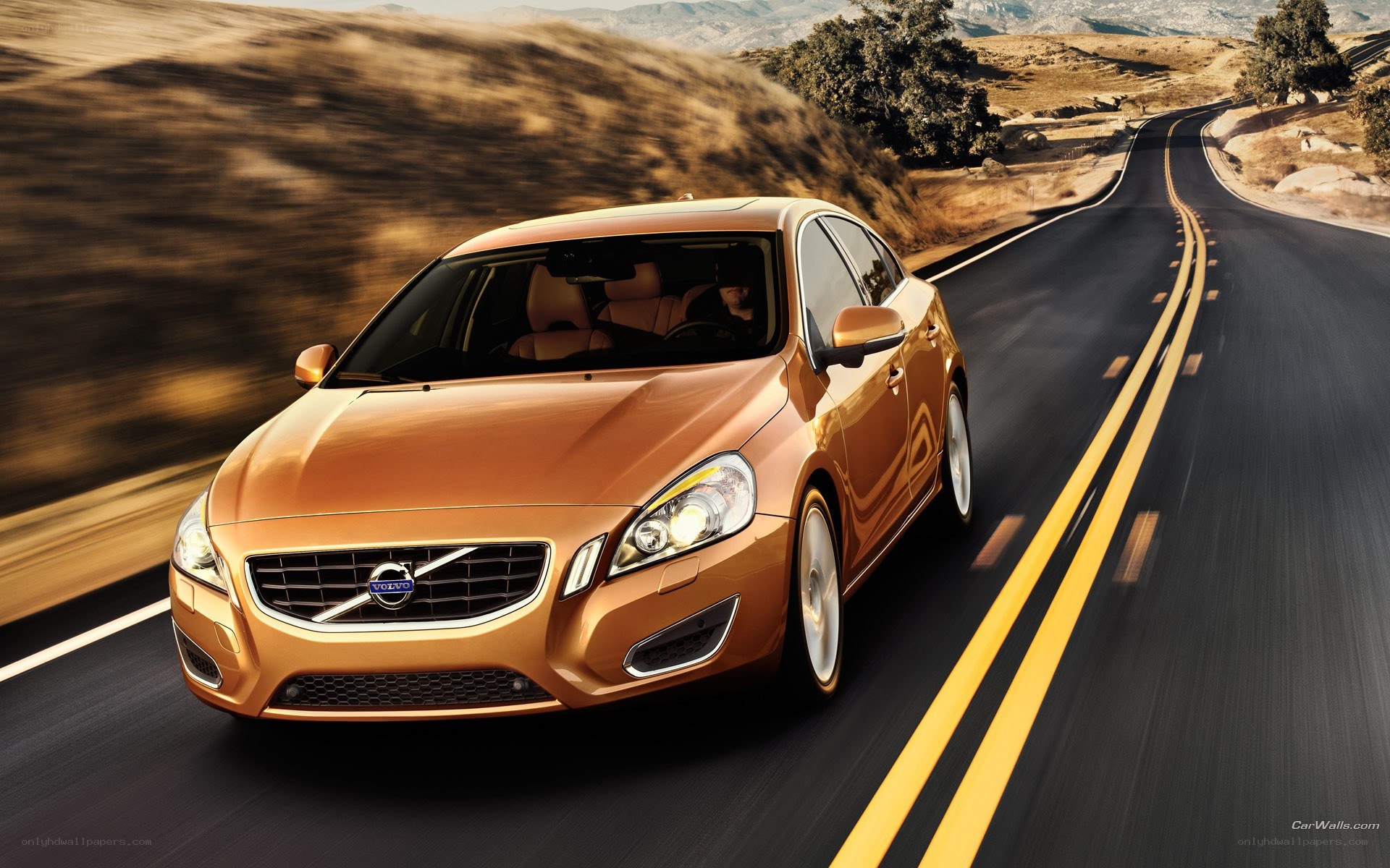 Volvo driving on a road