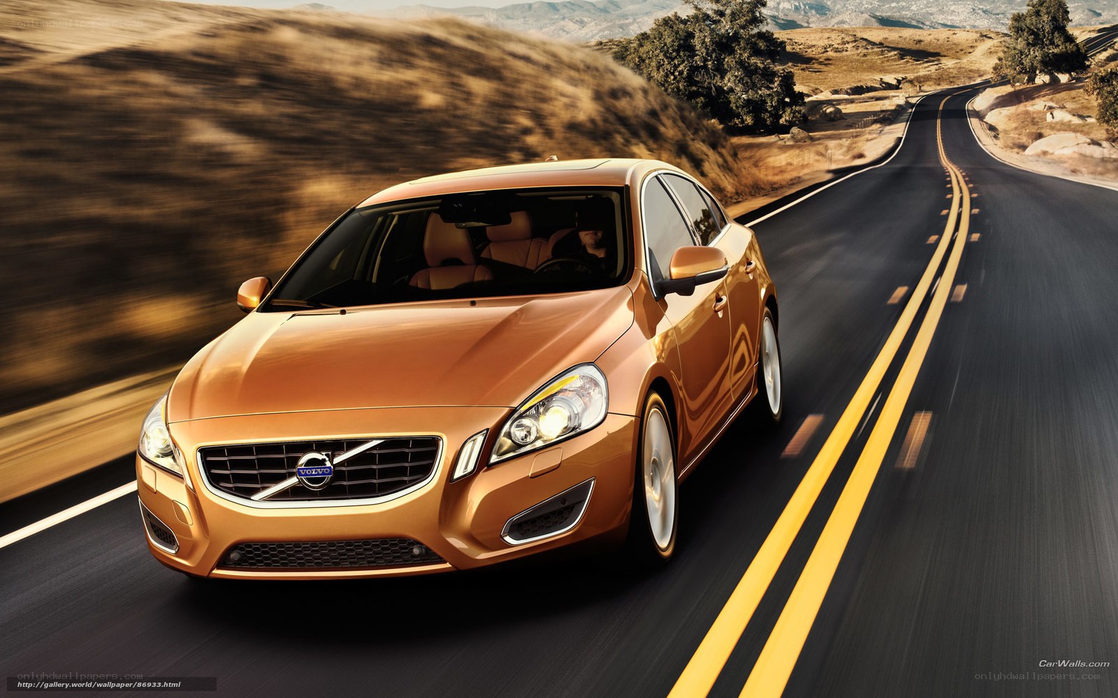Volvo driving on a winding road