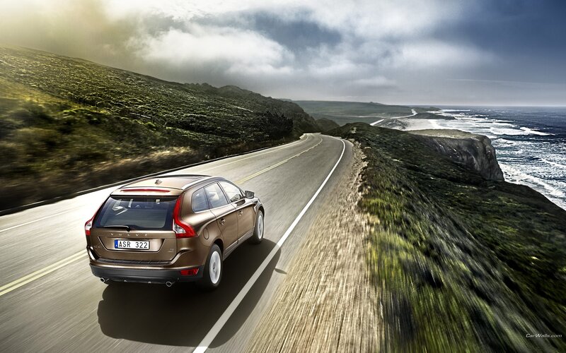 Volvo driving on coastal road