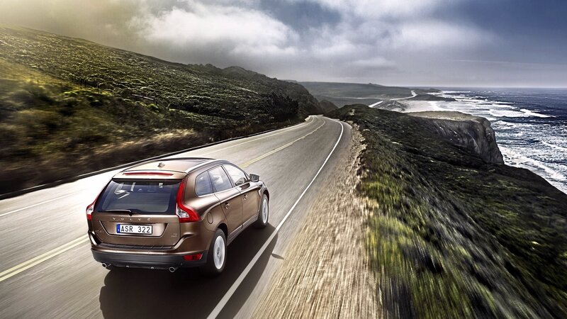 Volvo driving on coastal road