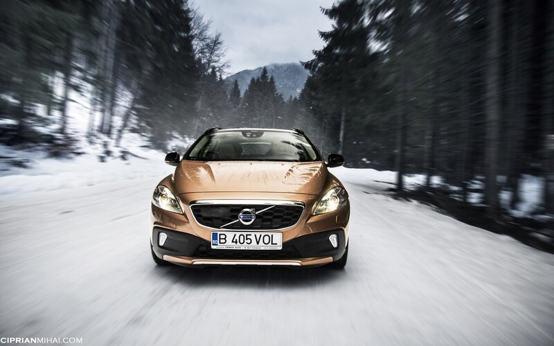 Volvo driving on snowy road
