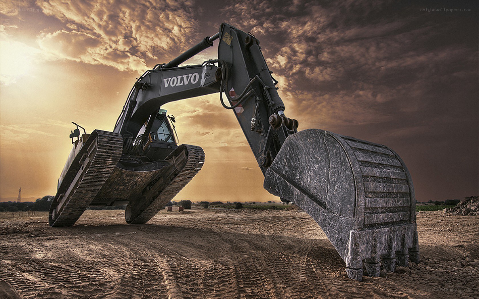 Volvo excavator at sunset