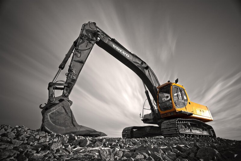 Volvo Excavator on Rocks