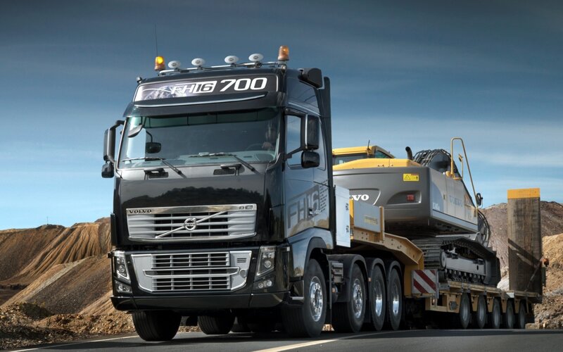 Volvo FH16 700 truck with excavator