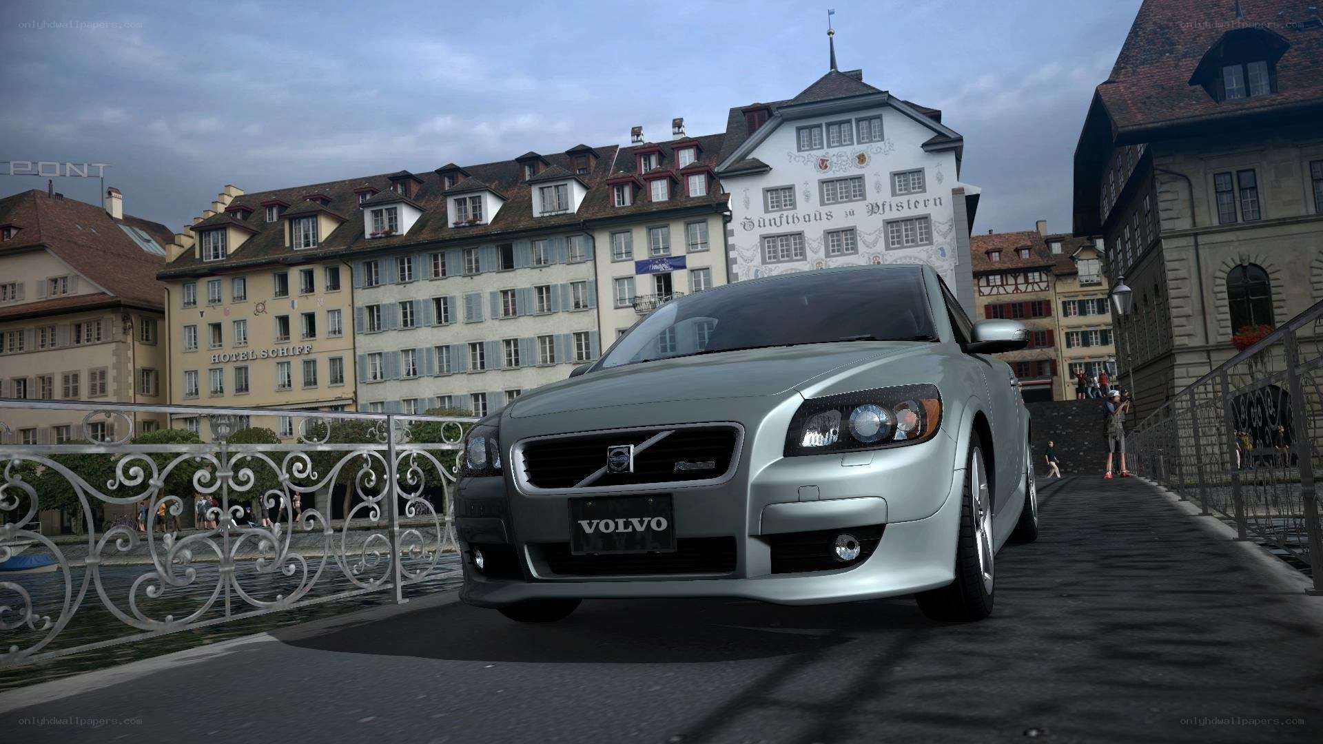 Volvo on a city bridge