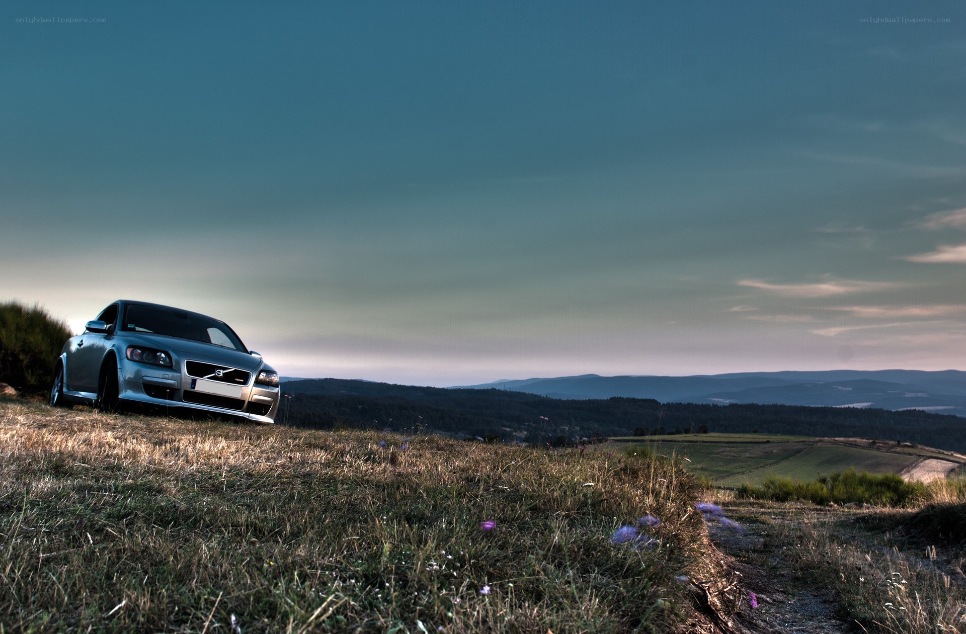 Volvo on a hill at dusk