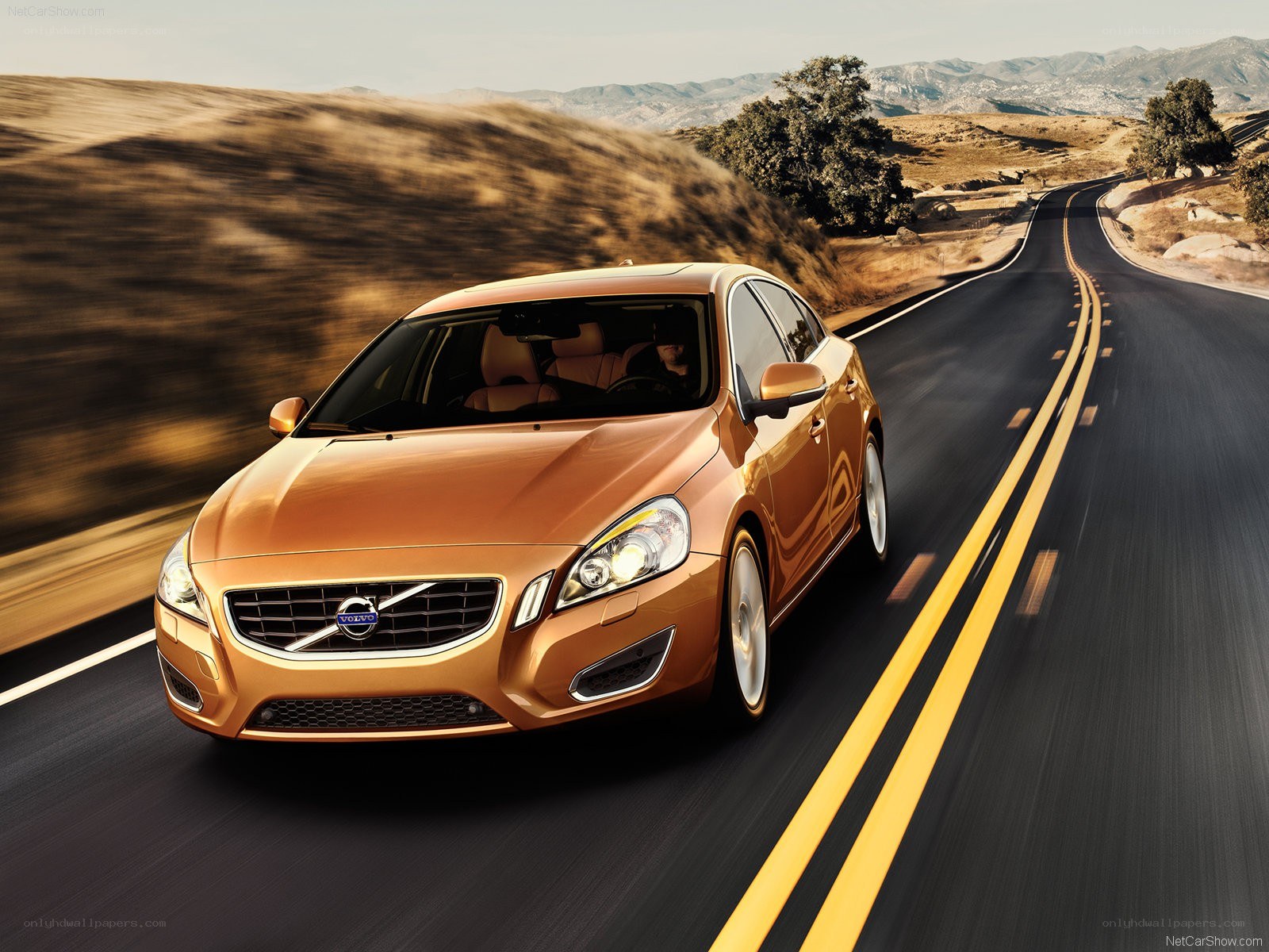 Volvo S60 driving on a road