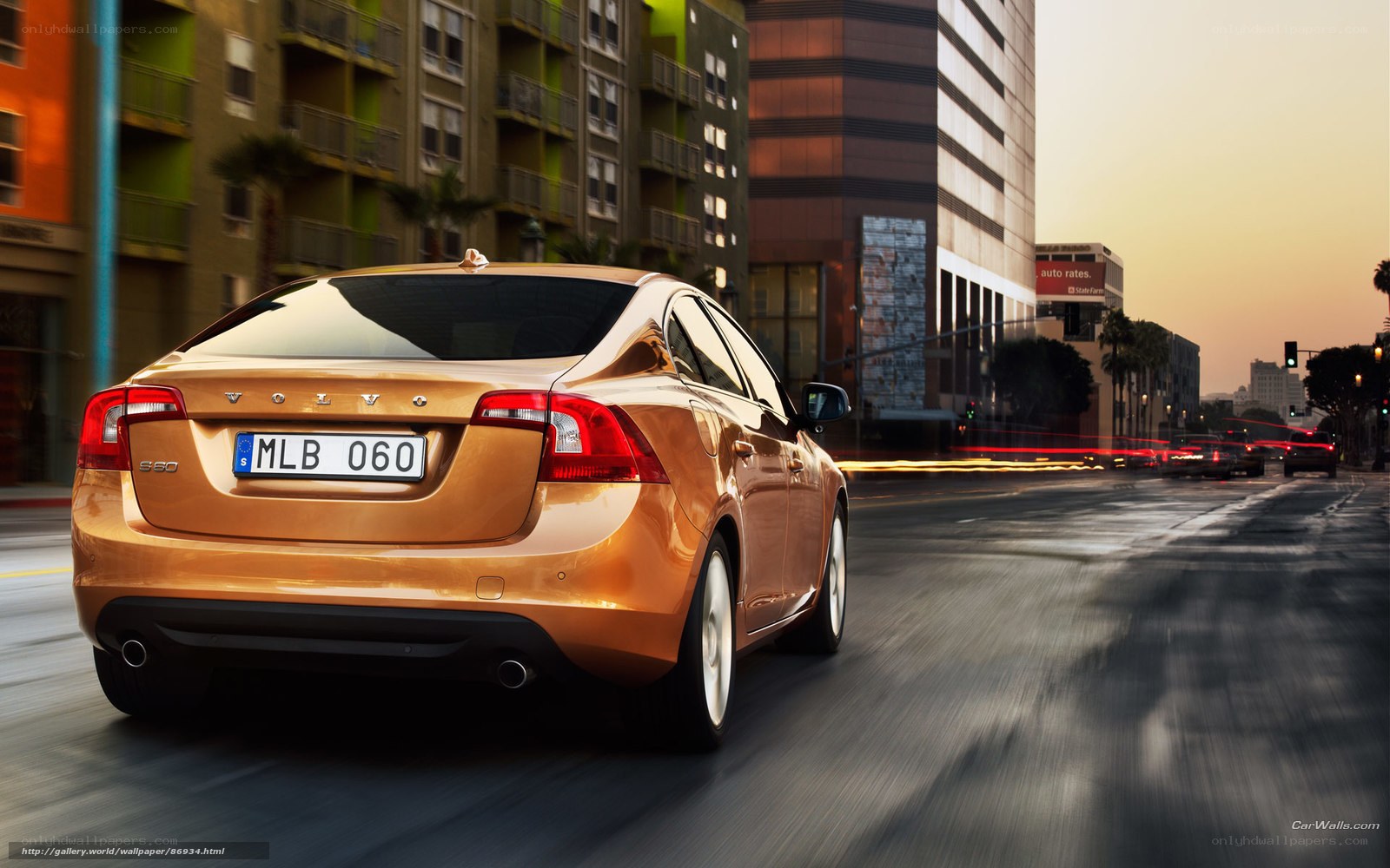 Volvo S60 in city at sunset