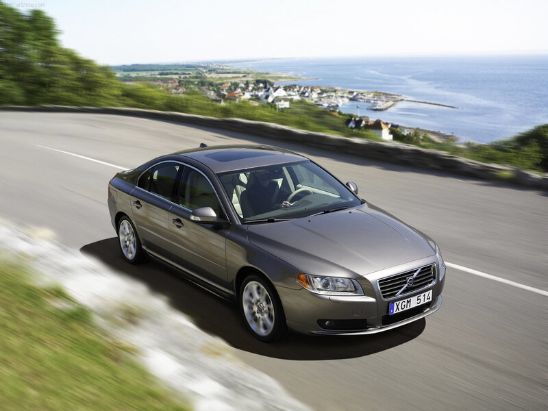 Volvo S80 driving on coastal road