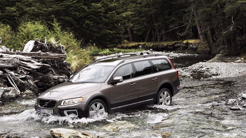 Volvo station wagon crossing river