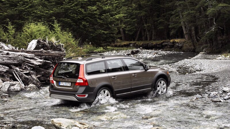 Volvo station wagon crossing river