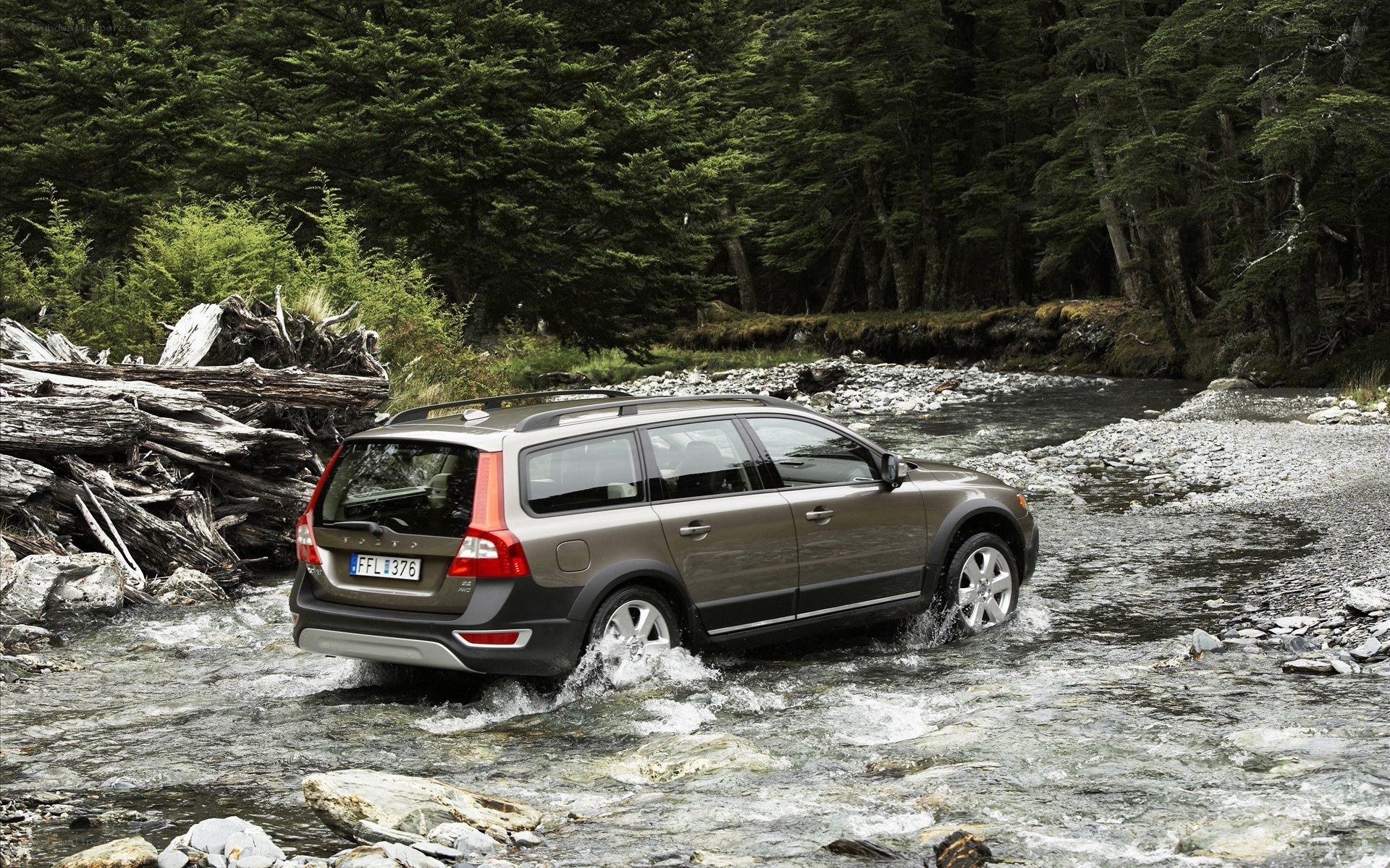 Volvo station wagon crossing river
