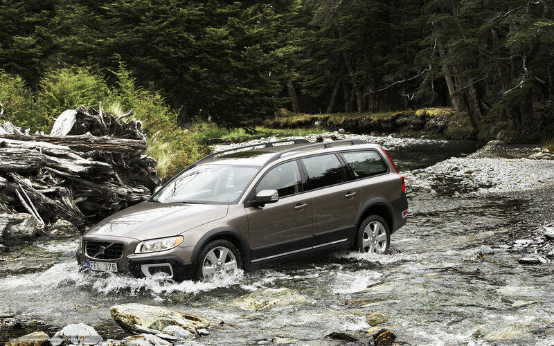 Volvo station wagon crossing river