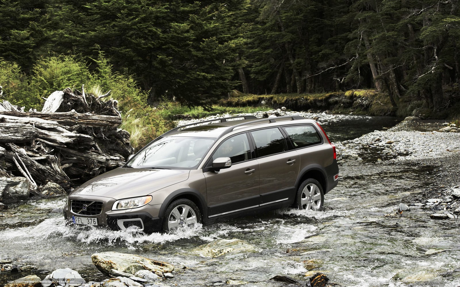 Volvo station wagon crossing river