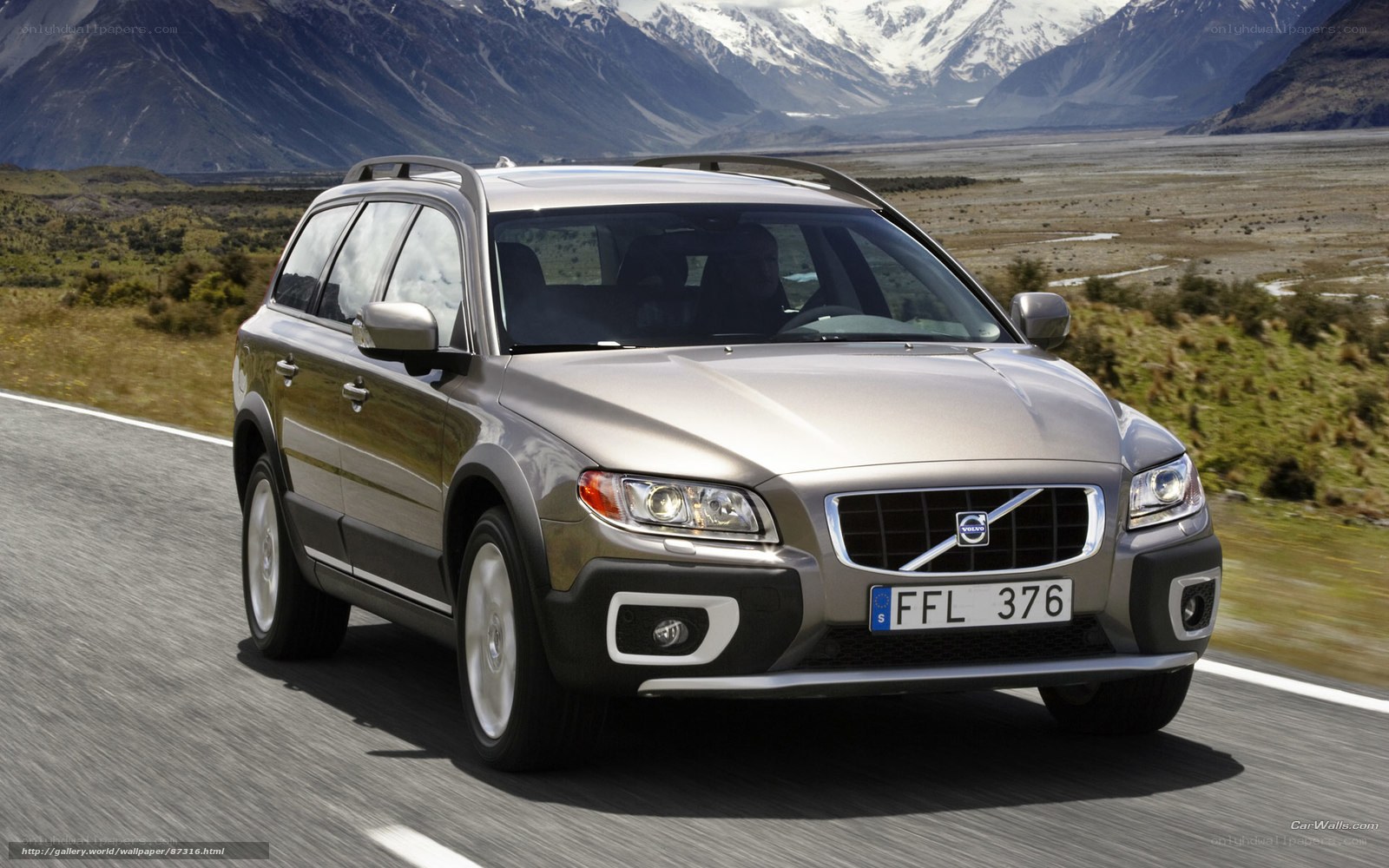 Volvo station wagon on mountain road