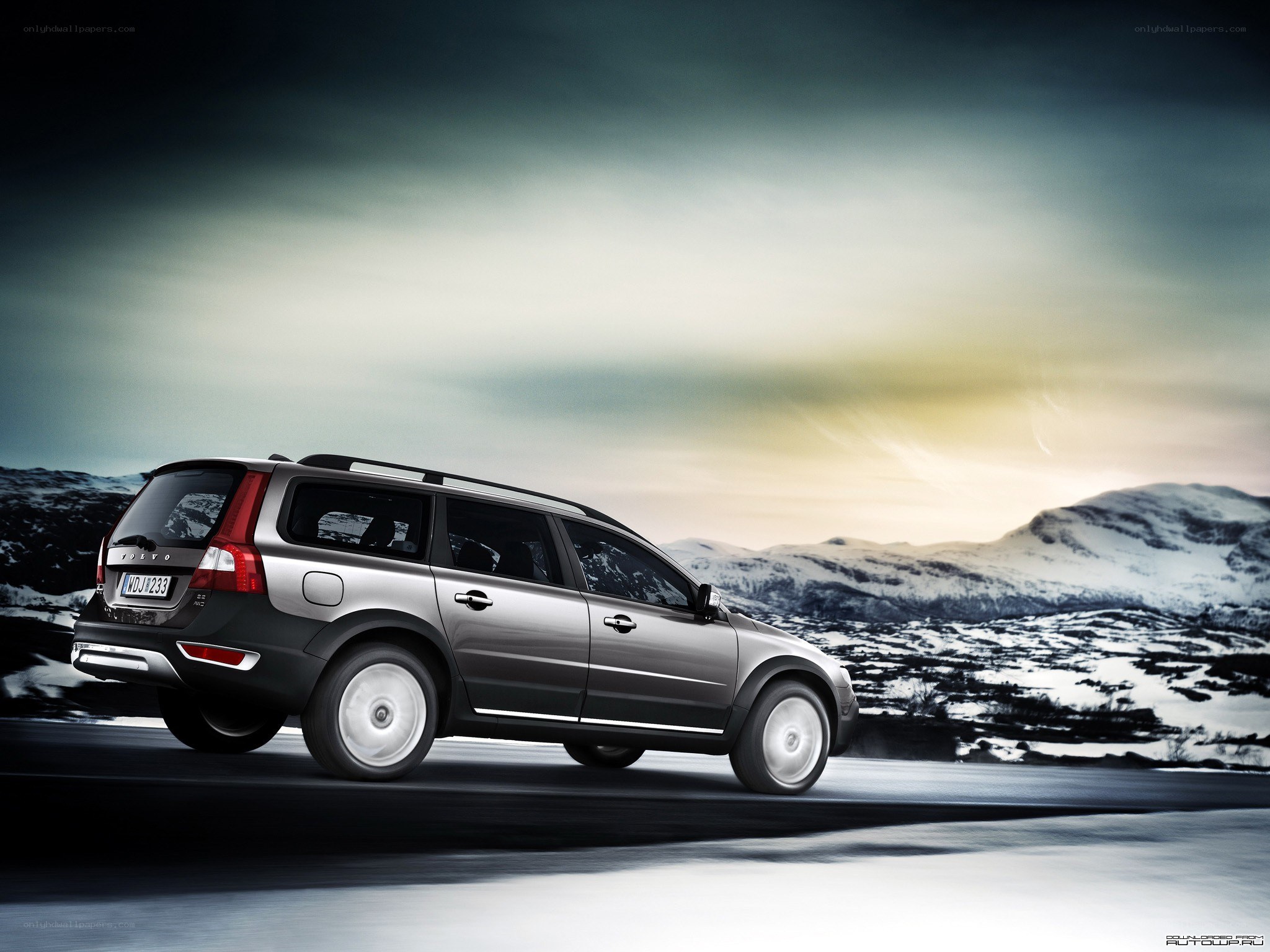 Volvo station wagon on snowy road