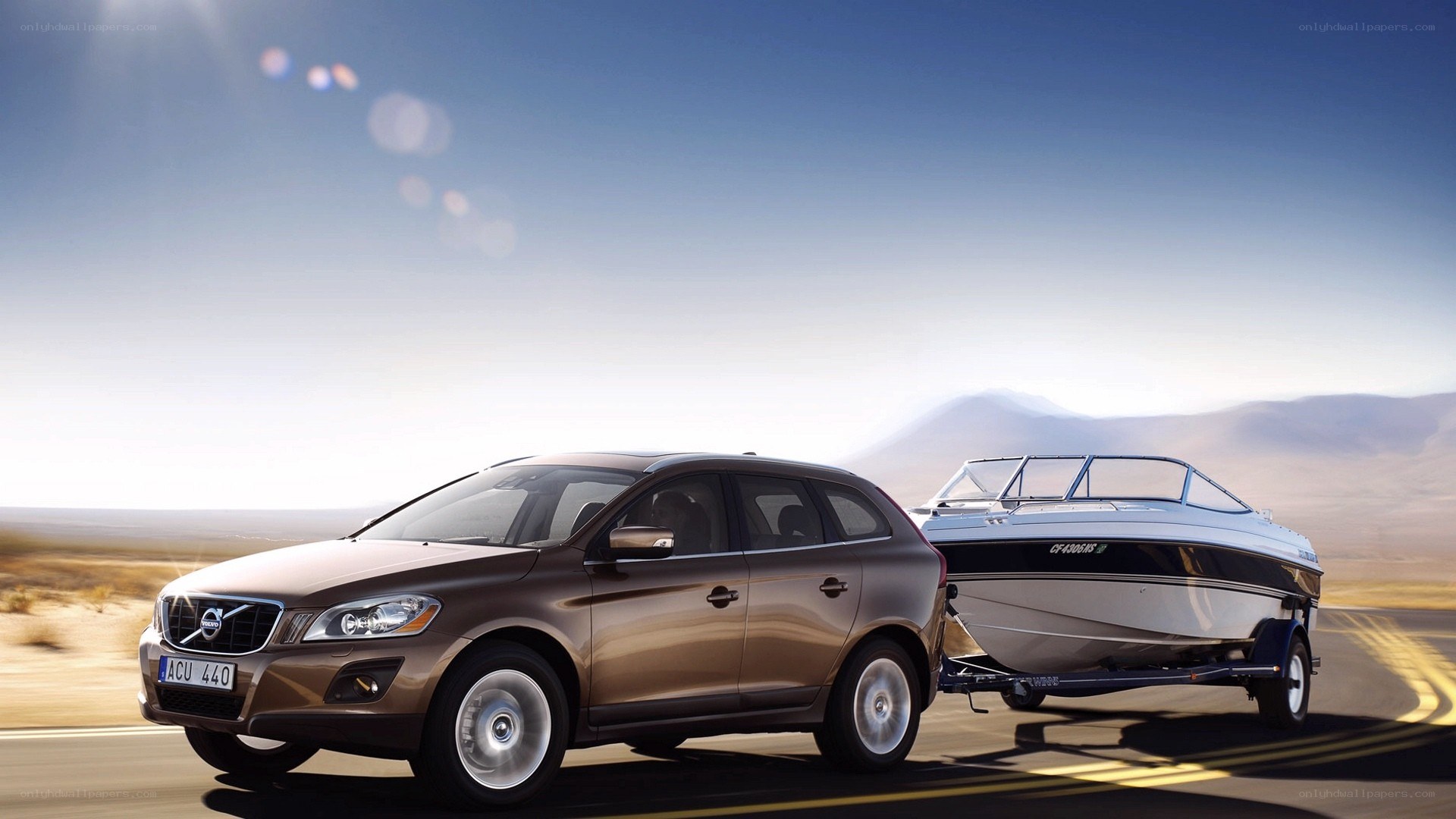 Volvo V60 towing a boat