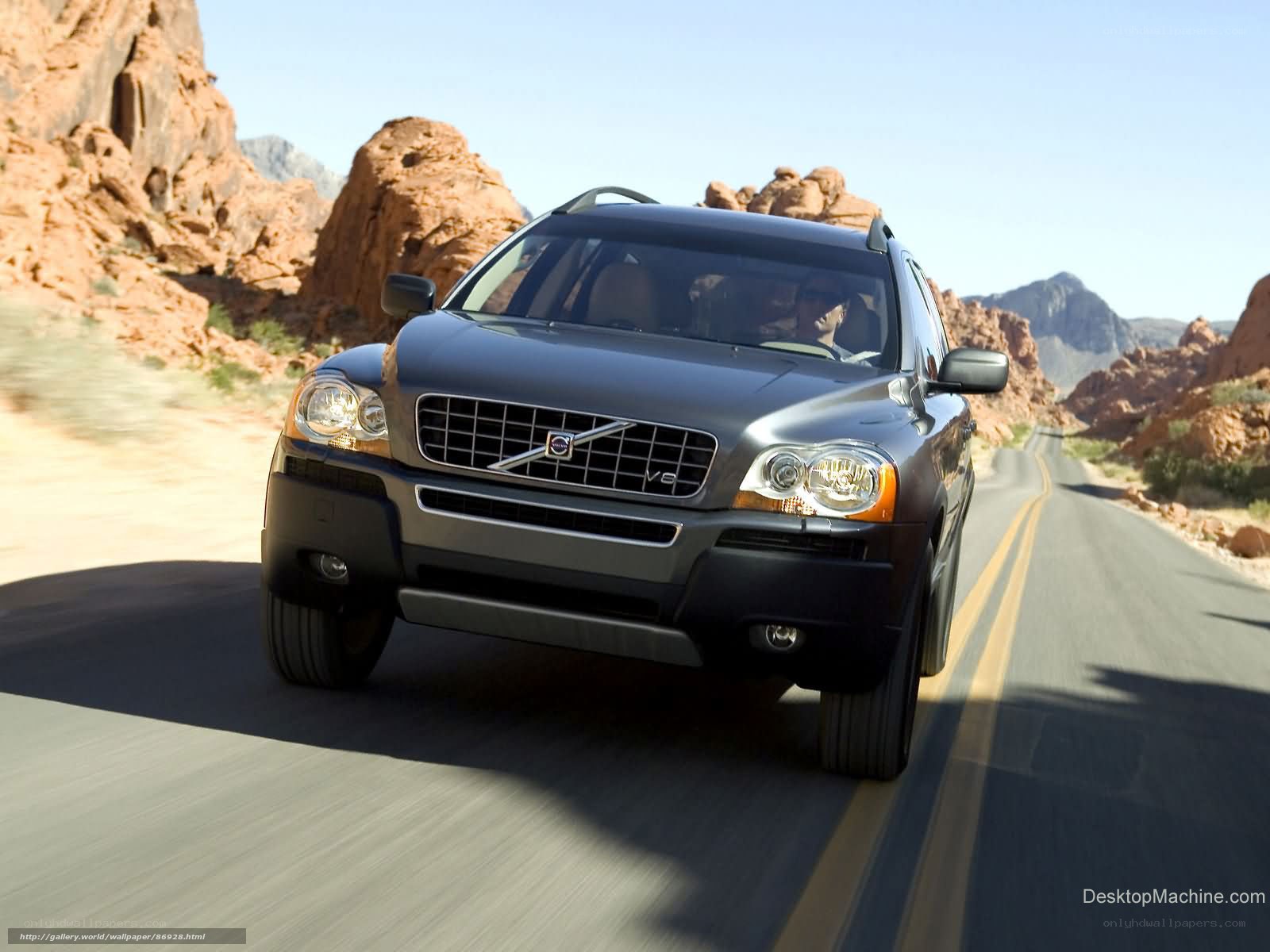 Volvo XC90 driving on desert road