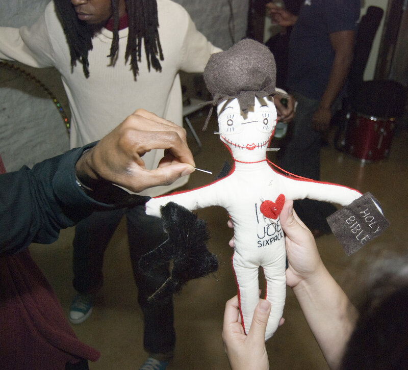 Voodoo doll being used in ritual