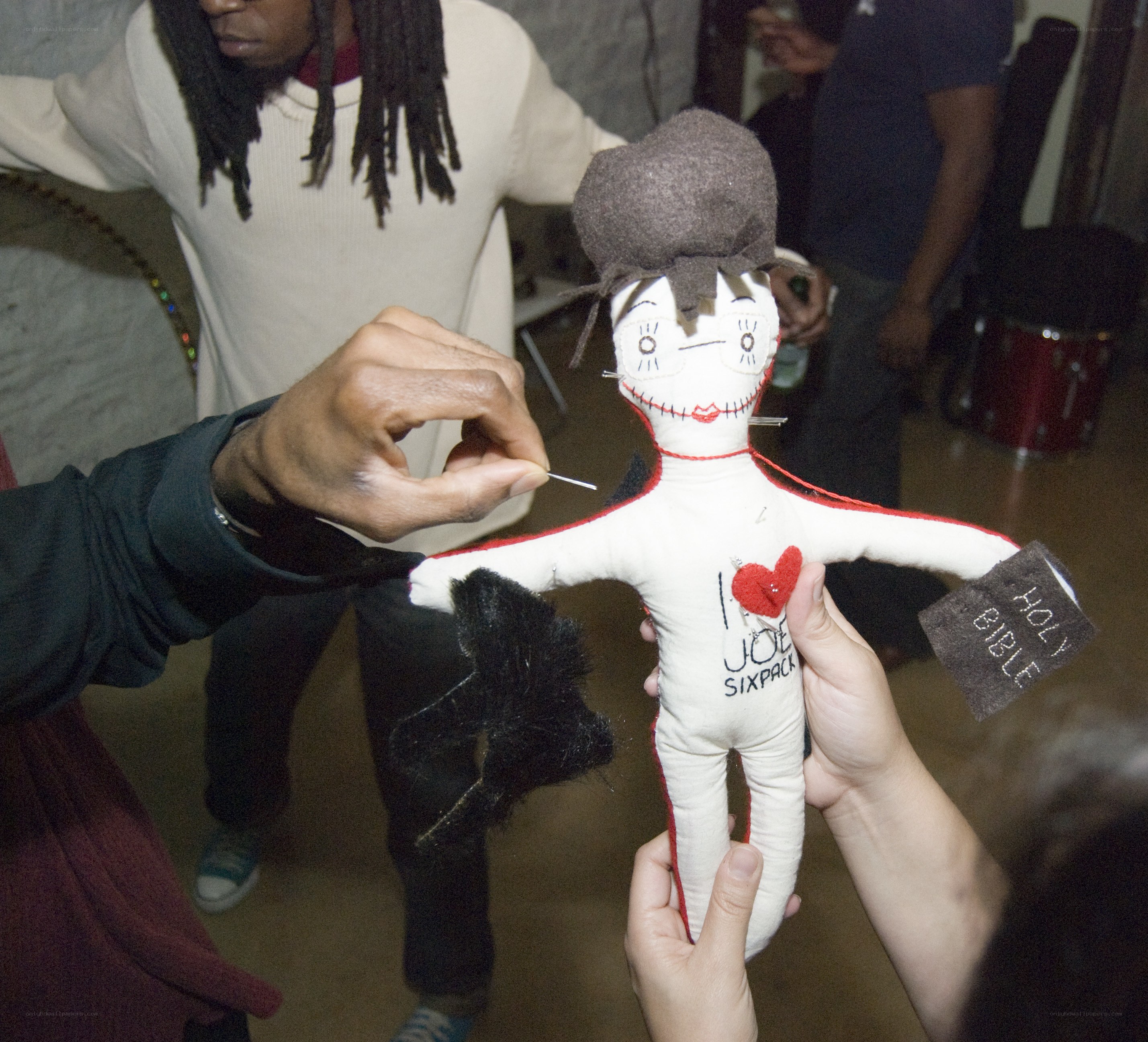 Voodoo doll being used in ritual