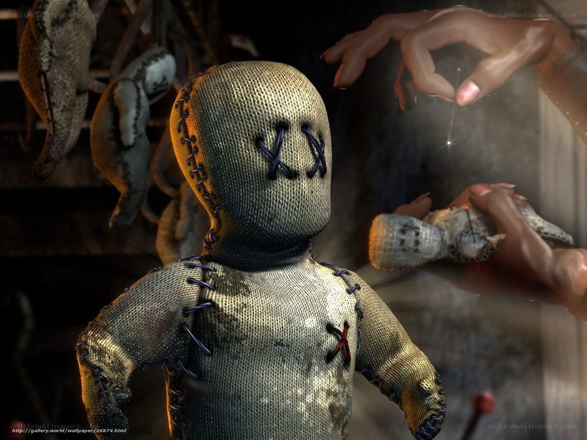 Voodoo doll in dark room